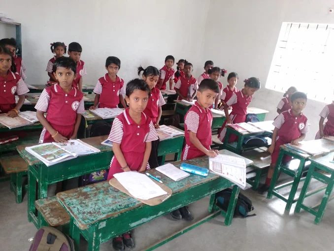 Students learning in a classroom at New Generation Matriculation School